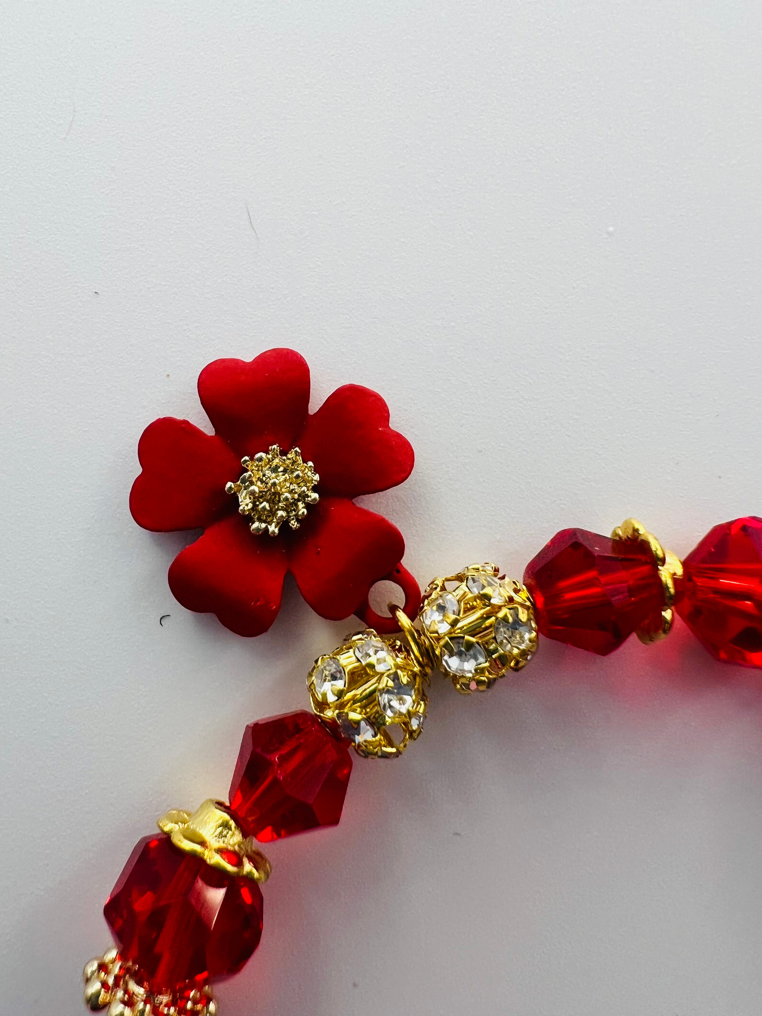 Red Floral Charm Bracelet with Tassel Accent