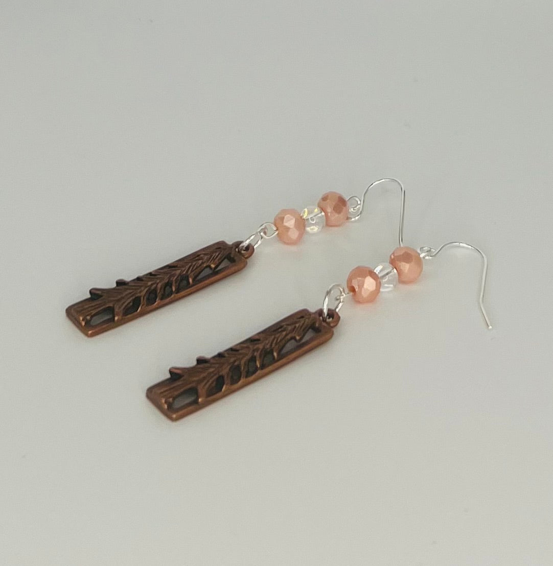 Copper Mountain Carved Earrings Accented with Pink Glass Beads