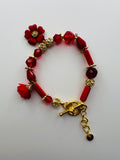 Red Floral Charm Bracelet with Tassel Accent