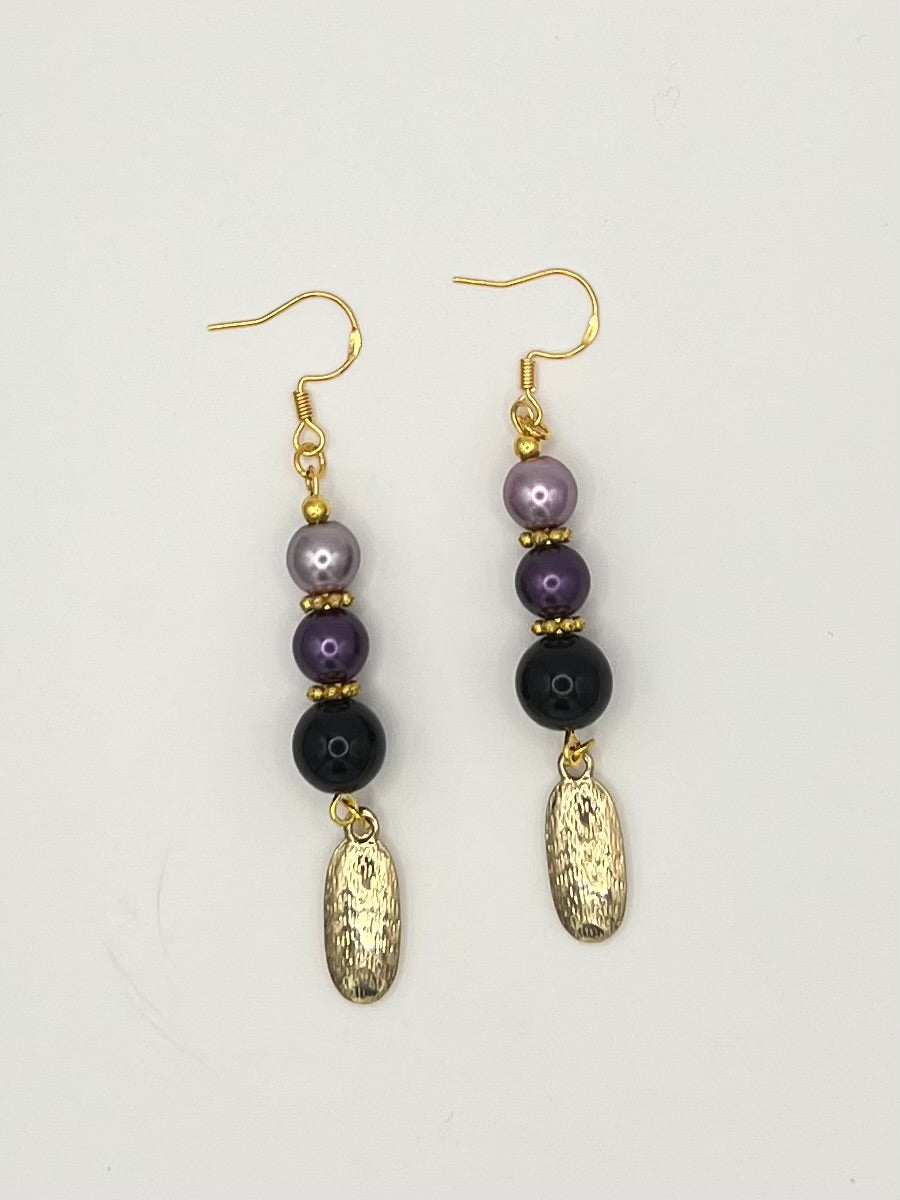 Purple & Black Beaded Dangle Earrings with Gold Tone Charm