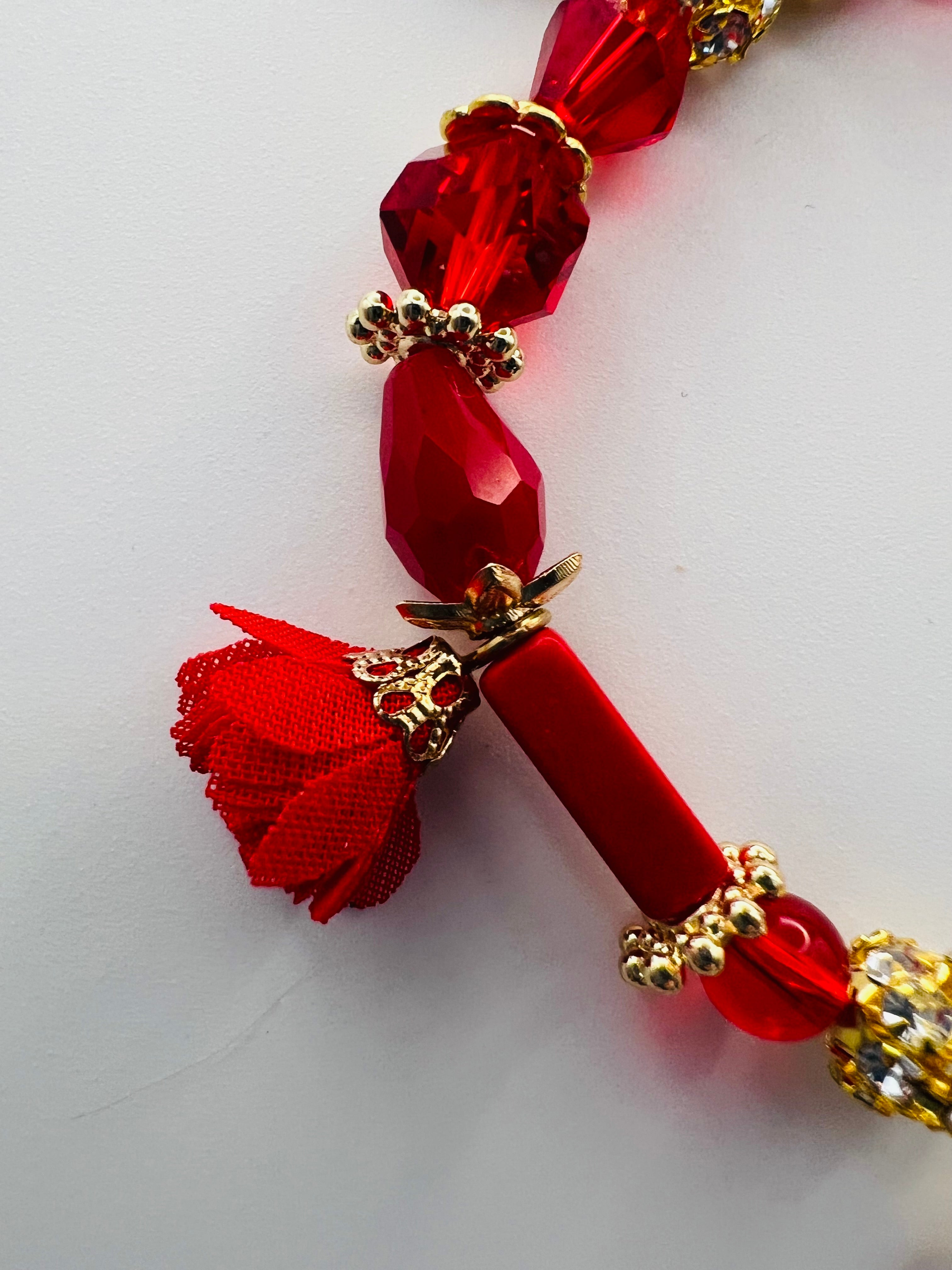 Red Floral Charm Bracelet with Tassel Accent