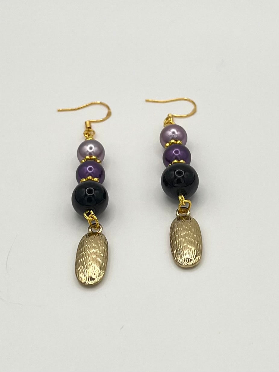 Purple & Black Beaded Dangle Earrings with Gold Tone Charm