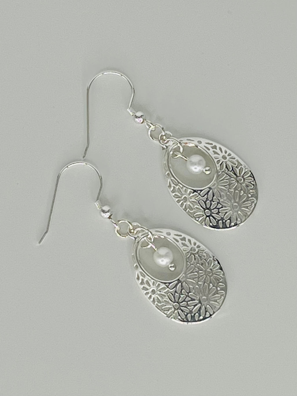 Silver Tone Oval Floral Pattern with Faux Pearl Accent