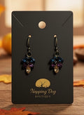 Jewel-Tone Crystal Leaf Dangle Earrings – Blue, Purple & Champagne