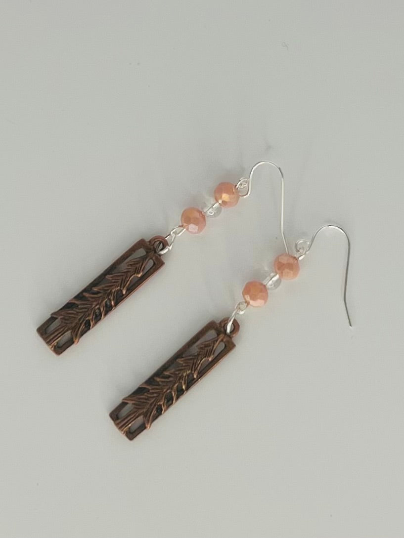 Copper Mountain Carved Earrings Accented with Pink Glass Beads