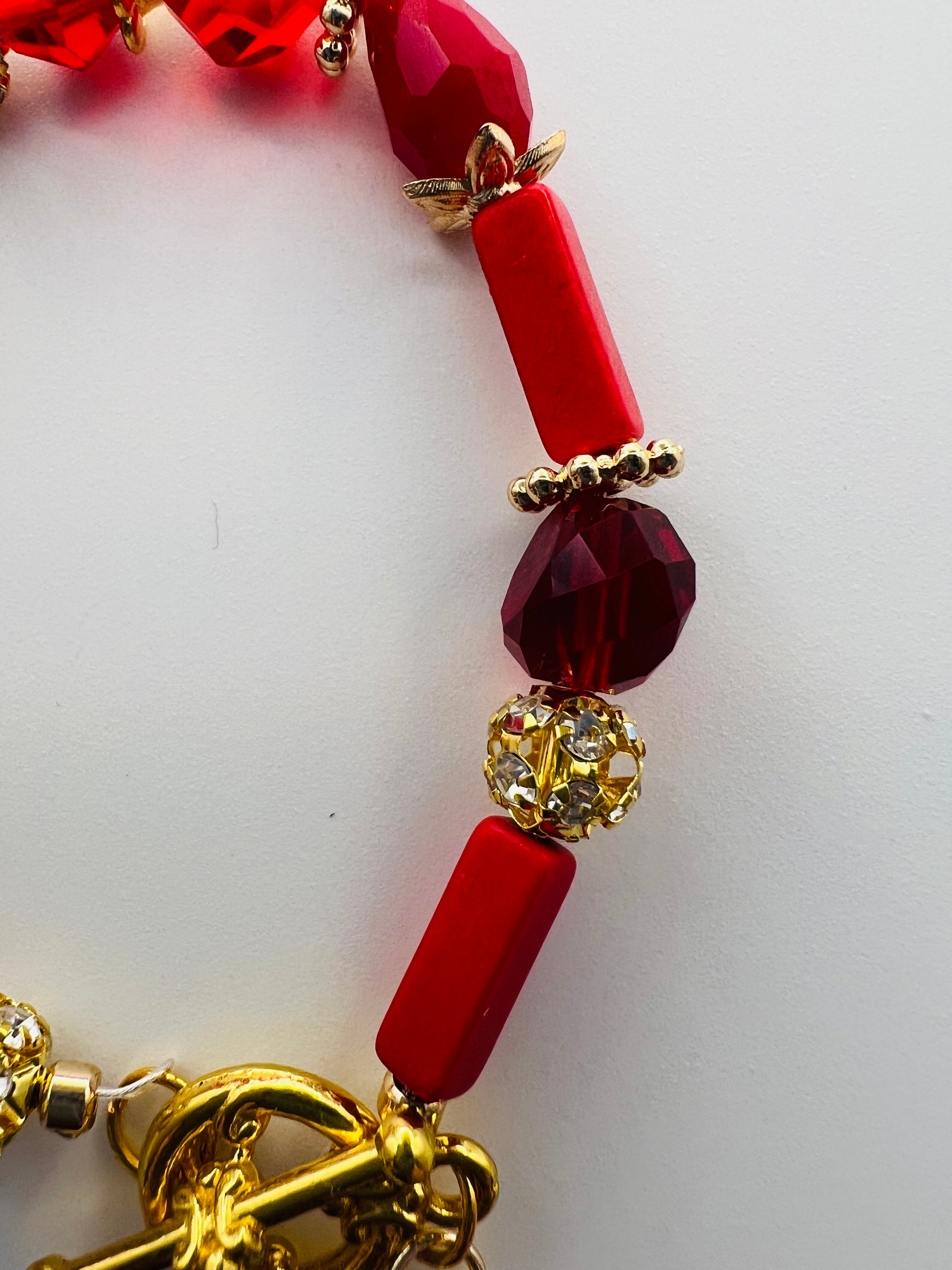Red Floral Charm Bracelet with Tassel Accent