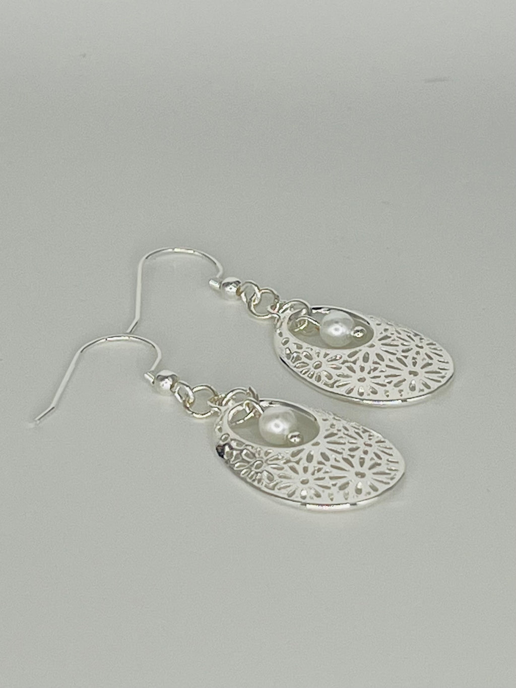 Silver Tone Oval Floral Pattern with Faux Pearl Accent