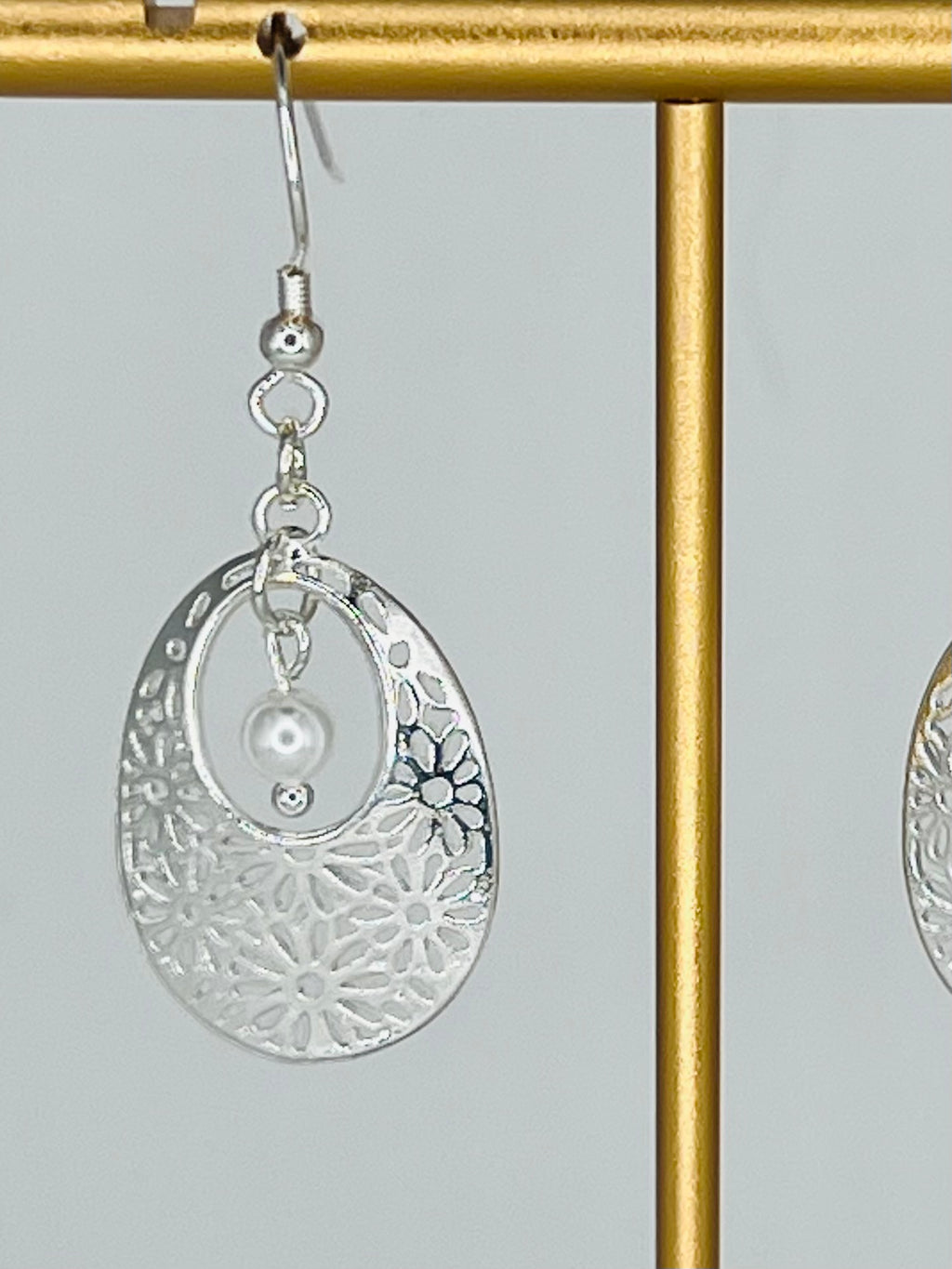 Silver Tone Oval Floral Pattern with Faux Pearl Accent