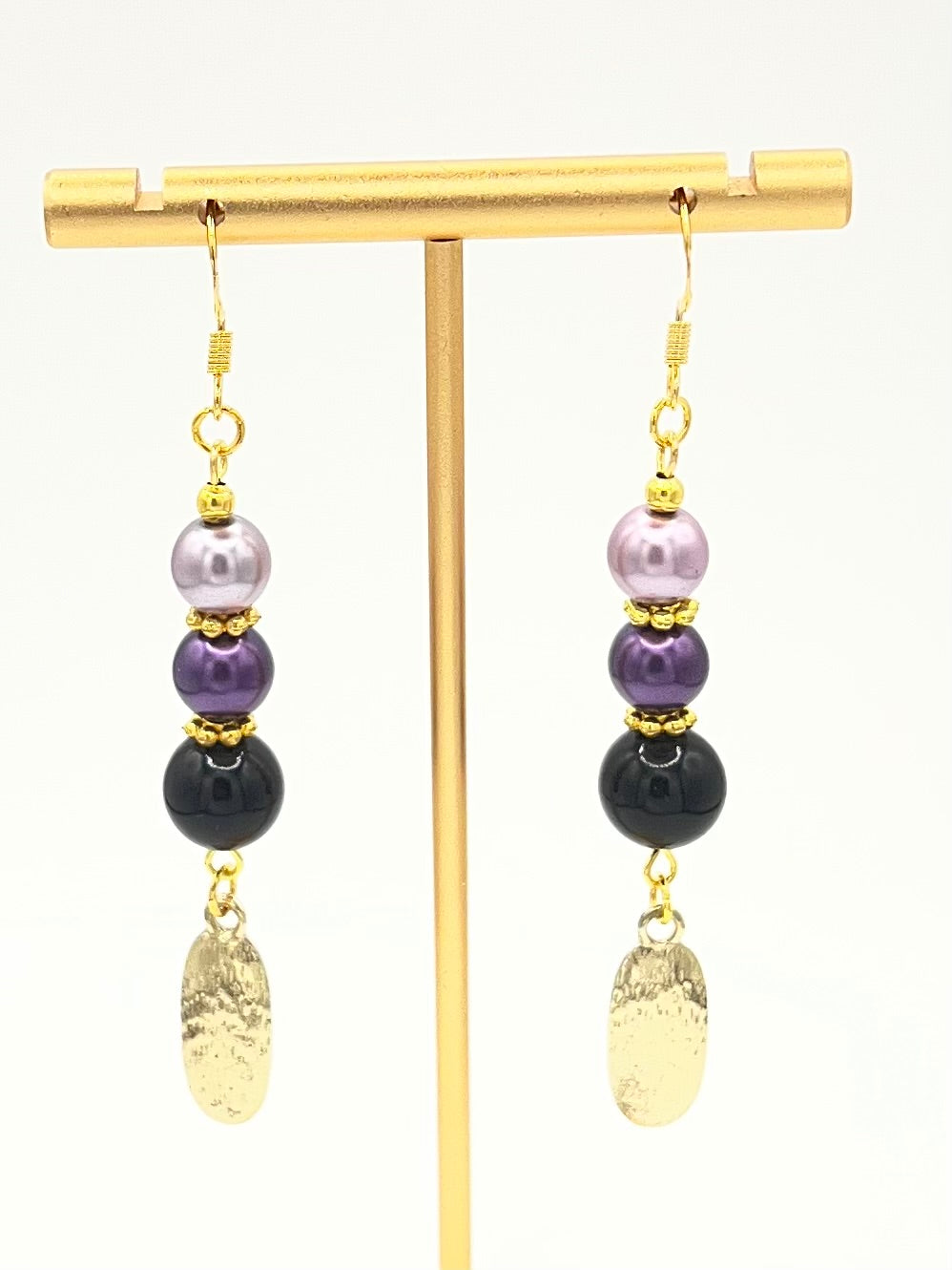 Purple & Black Beaded Dangle Earrings with Gold Tone Charm