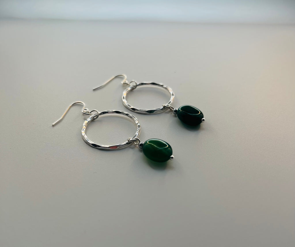 Silver Tone Hoop Earrings Accented with Green Beads and Sterling Silver Ear Wires