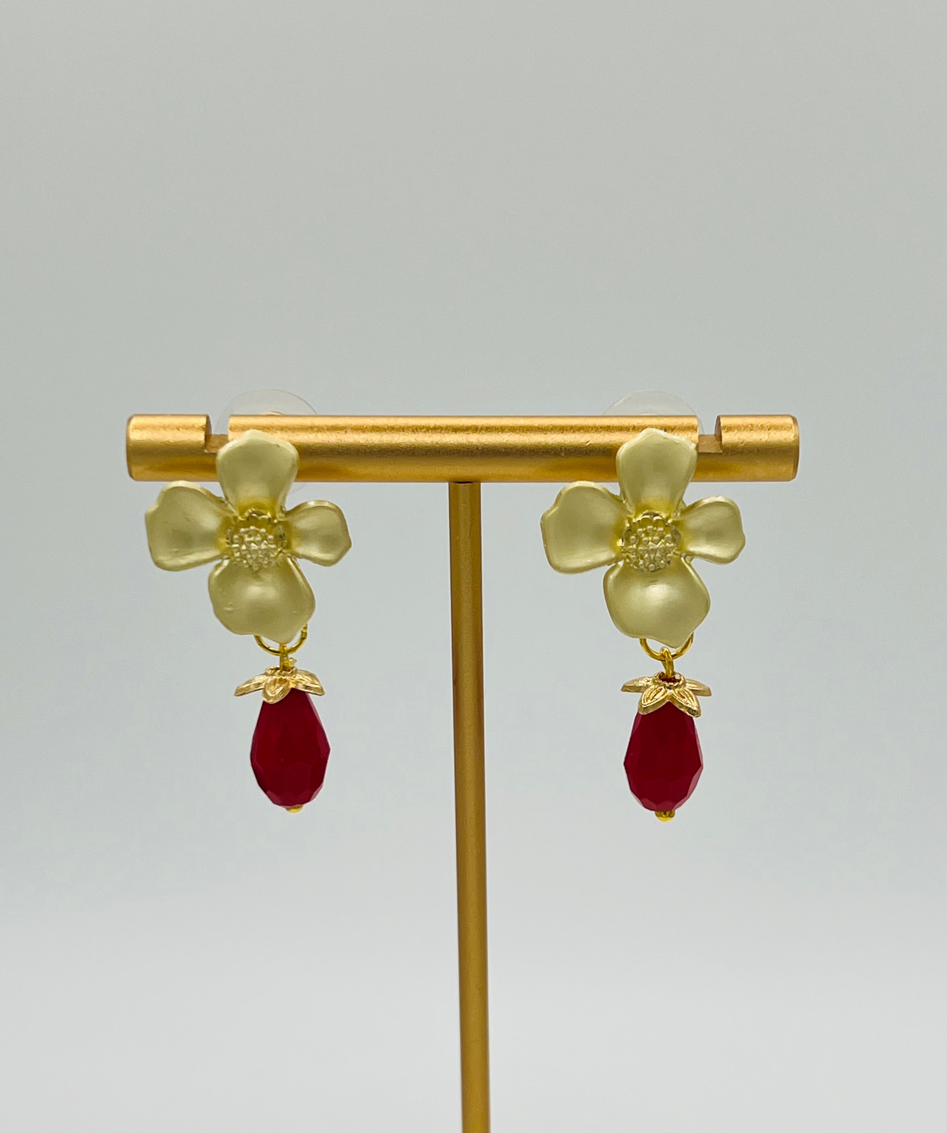 Gold Floral Earrings with Red Teardrop Crystal Dangle